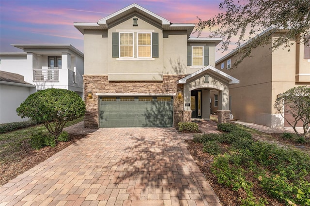 view of front of property featuring a garage