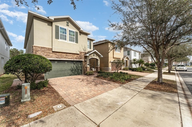 view of front of property with a garage