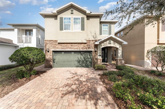 view of front of property with a garage