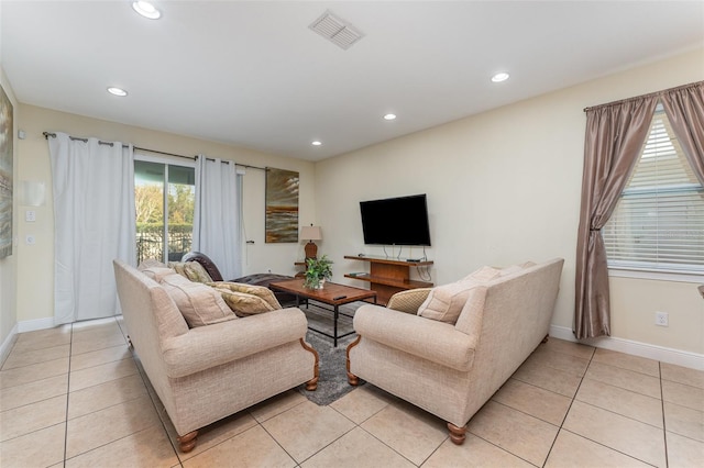 living room with light tile patterned floors