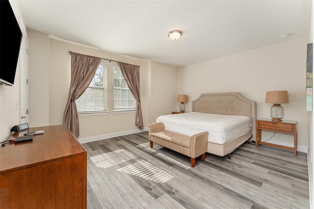 bedroom featuring light wood-type flooring