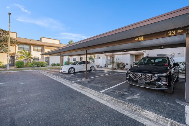 view of parking with a carport