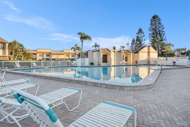 view of pool featuring a patio area