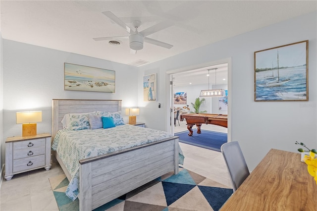 bedroom with billiards and ceiling fan