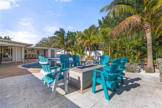 view of patio featuring an outdoor fire pit