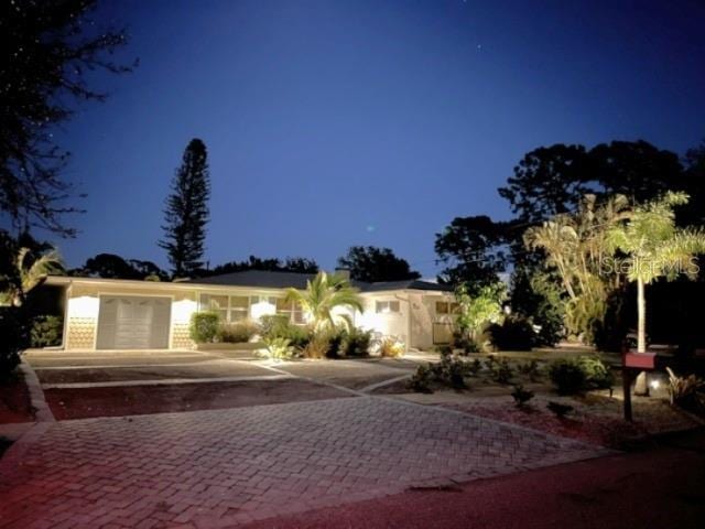 view of front of property with a garage