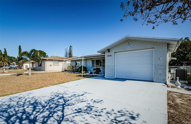 single story home featuring central AC