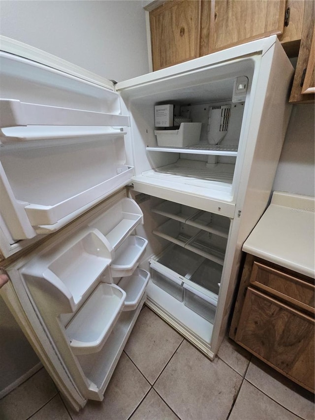 interior details featuring fridge