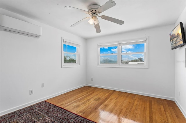 8716 Hickorywood Ln, Tampa, FL 33615 - unfurnished room with light wood-style floors, a ceiling fan, baseboards, and a wall mounted AC