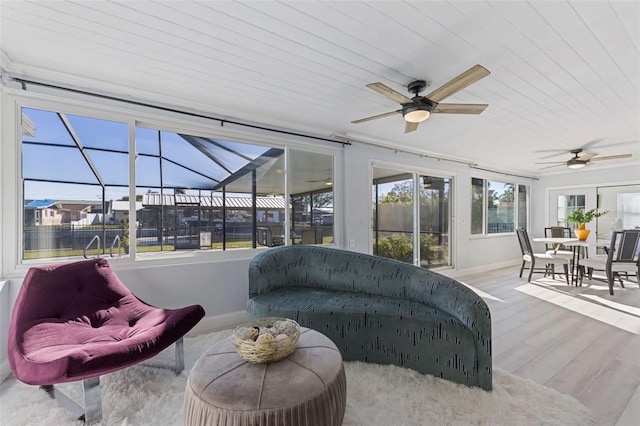 8716 Hickorywood Ln, Tampa, FL 33615 - sunroom / solarium with outdoor dining area and ceiling fan