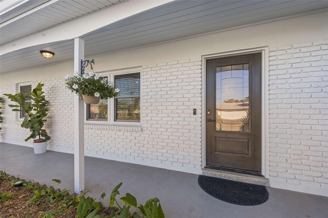 8716 Hickorywood Ln, Tampa, FL 33615 - property entrance featuring brick siding