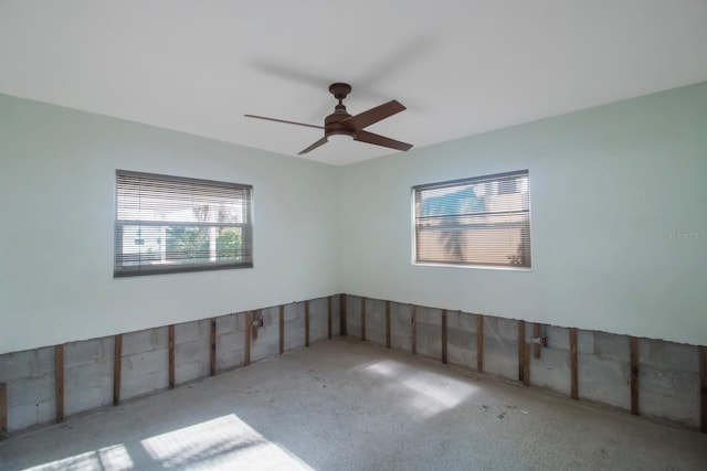 unfurnished room featuring ceiling fan