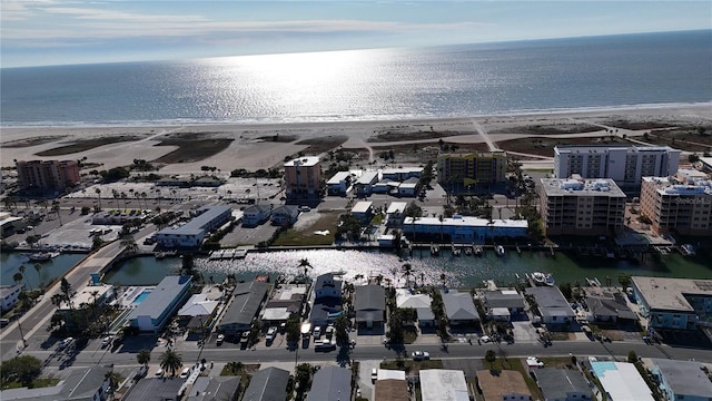 aerial view with a view of the beach and a water view