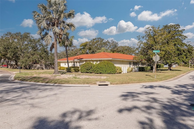 exterior space with a front lawn