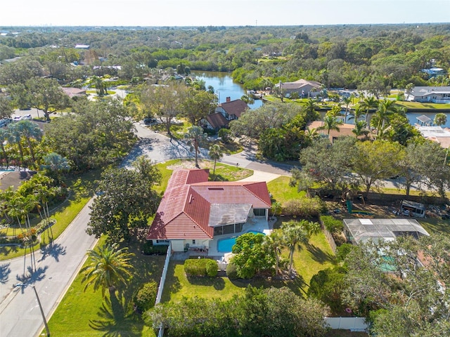 drone / aerial view with a water view