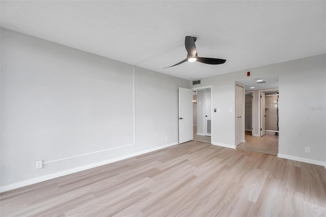 unfurnished bedroom featuring ceiling fan and light hardwood / wood-style flooring