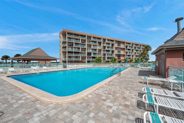 view of pool featuring a patio