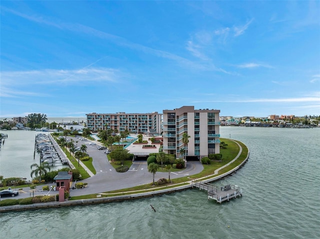 birds eye view of property featuring a water view