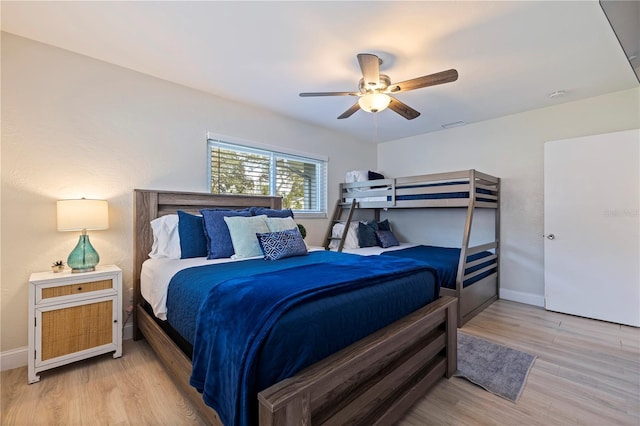 bedroom featuring ceiling fan and light wood-type flooring