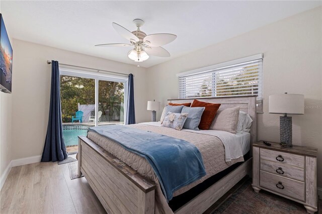 bedroom with ceiling fan, hardwood / wood-style flooring, and access to outside