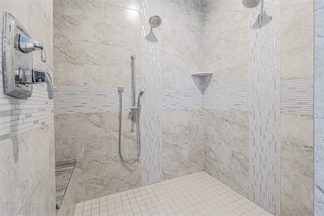 bathroom featuring a tile shower