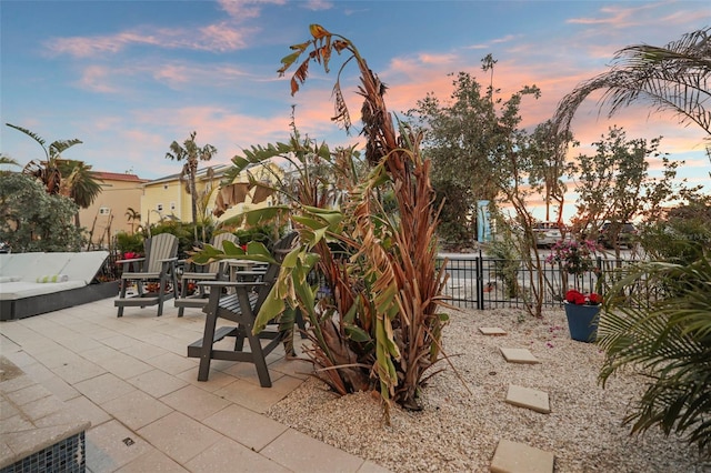 patio terrace at dusk with fence