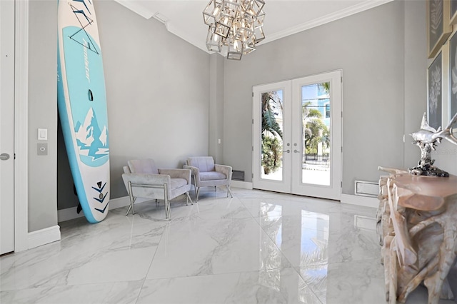 sitting room featuring french doors, baseboards, marble finish floor, and ornamental molding