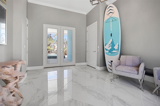 living area with baseboards, marble finish floor, french doors, and ornamental molding