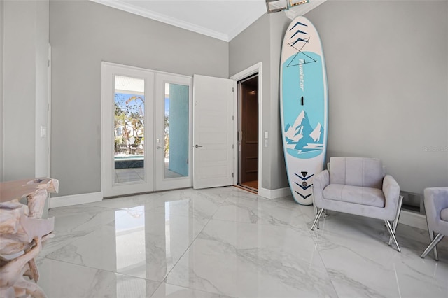 entrance foyer with french doors, baseboards, marble finish floor, and crown molding