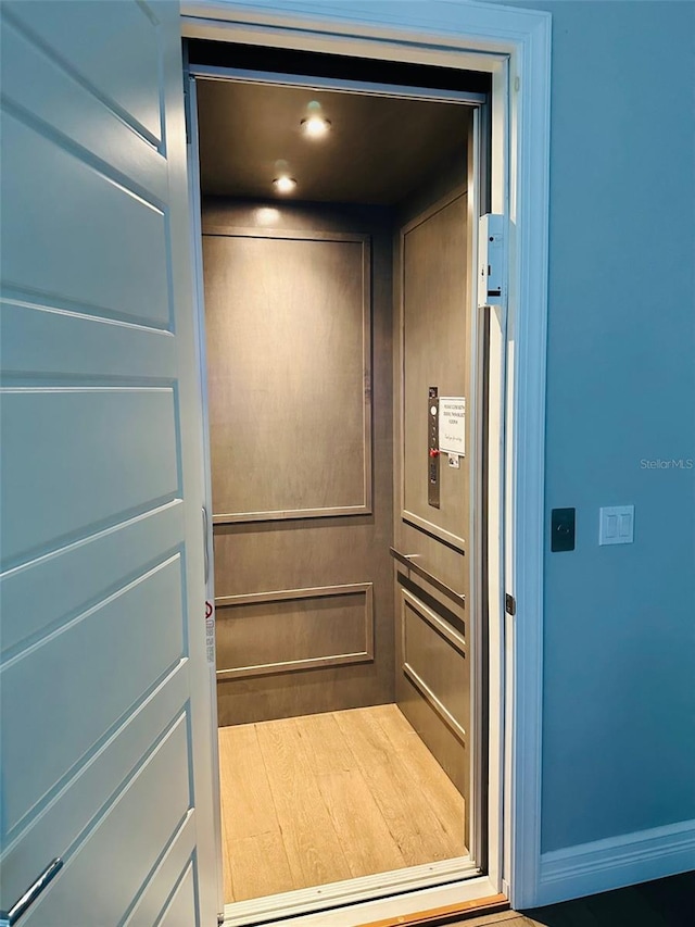 room details featuring recessed lighting and elevator