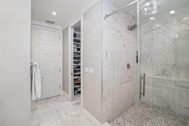 bathroom with visible vents, marble finish floor, a stall shower, and a spacious closet