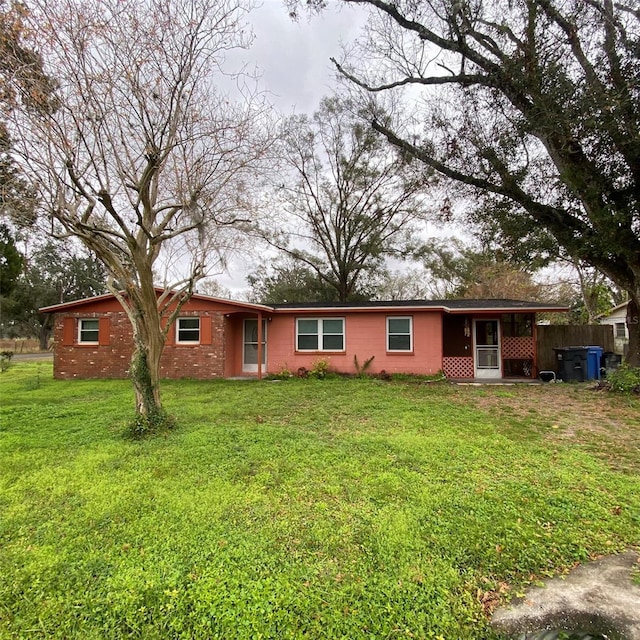 view of front facade with a front lawn