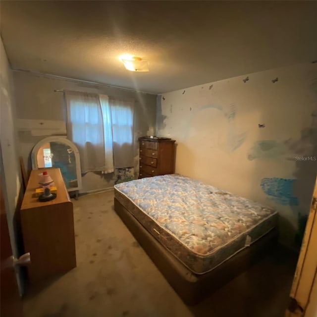 bedroom with light colored carpet