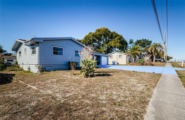 view of property exterior with a garage