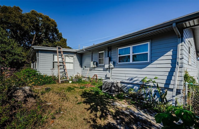 single story home featuring cooling unit