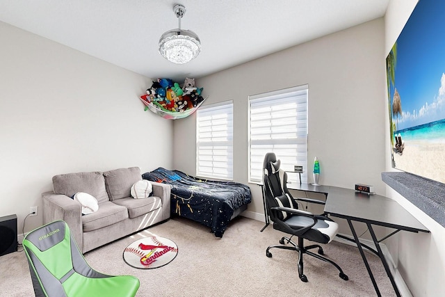 bedroom with light carpet