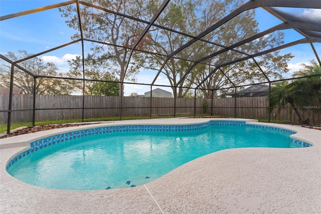 view of pool with a lanai