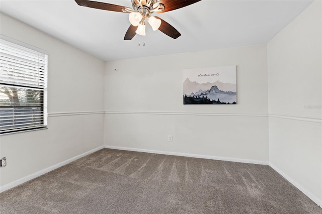 carpeted empty room with ceiling fan