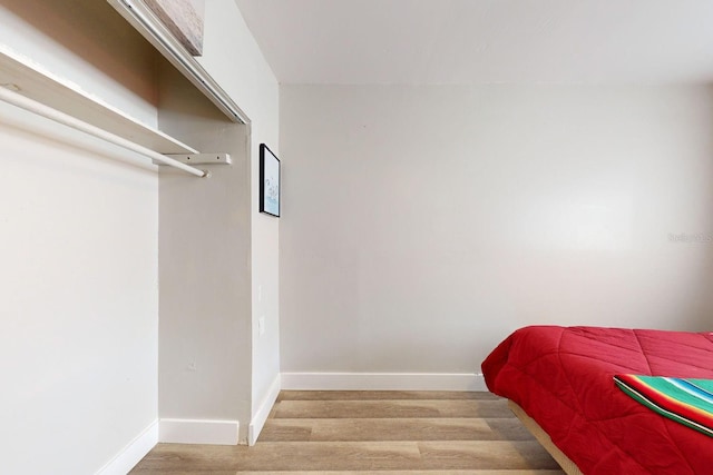 bedroom featuring wood-type flooring