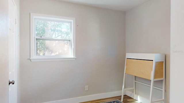 empty room featuring hardwood / wood-style flooring