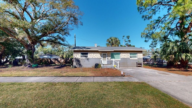 view of front of home with a front lawn