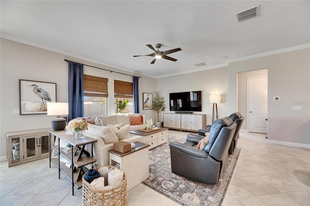 living room featuring ceiling fan, light tile patterned floors, and ornamental molding