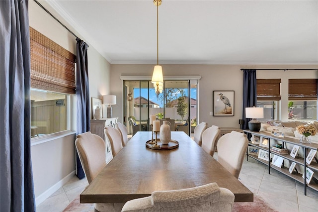 tiled dining space with crown molding