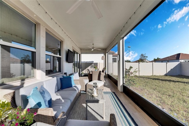 view of patio / terrace with ceiling fan and an outdoor hangout area