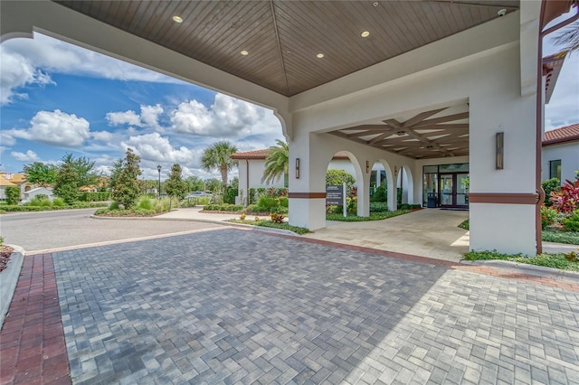 exterior space with french doors and ceiling fan