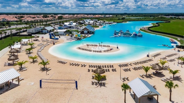 birds eye view of property with a water view