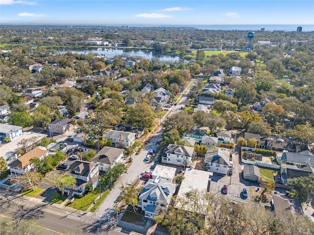 birds eye view of property featuring a water view and a residential view