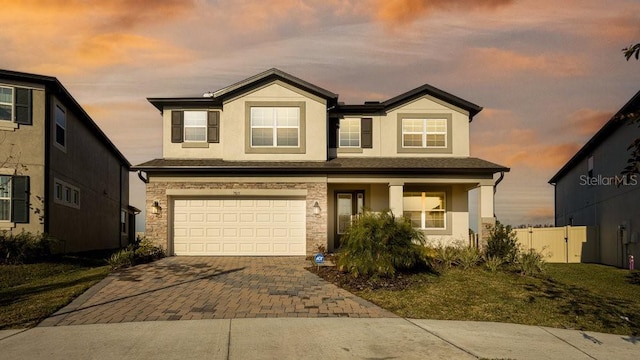 view of front of property featuring a garage