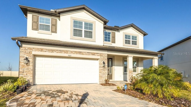 view of front of property featuring a garage