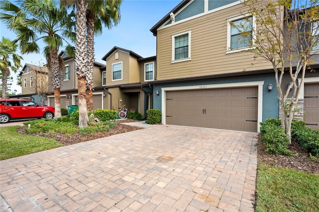 view of front of property featuring a garage